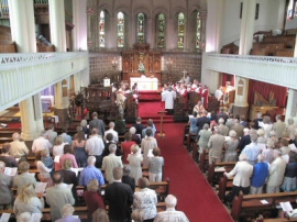 The choir sings during a service